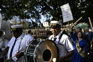 Krewe Joan of Arc, 2nd Line parade from cathedral to statue and restaurant